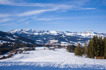 Fototapeta na wymiar The Chaine des Aravis in Europe, France, Rhone Alpes, Savoie, Alps, in winter, on a sunny day.