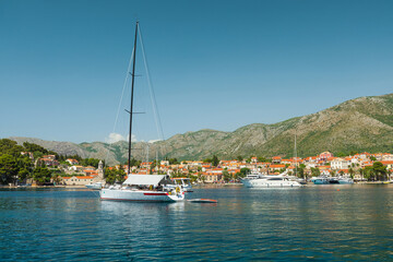 Fototapeta na wymiar Cavtat town in Dalmatia region, Croatia. Bay in Adriatic sea with yachts and boats. Summer vacation
