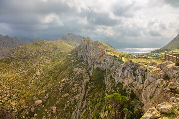 Fototapeta na wymiar Landscape of rocky coast before a storm under gloomy dramatic sky