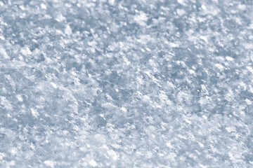 Snow from snowflakes, macro photo of white snow in winter, snow texture.