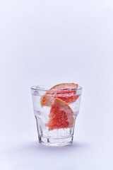 Grapefruit soda on white background