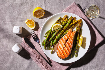 grilled salmon steak with asparagus and lemon