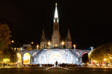 Fototapeta na wymiar LOURDES, FRANCE - OCTOBER 10 2021: Notre Dame du Rosaire de Lourdes at night