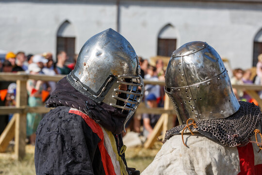Historical restoration of knightly fights. Summer time medieval festival .Festival of medieval culture in the old fortress with knightly battles.
