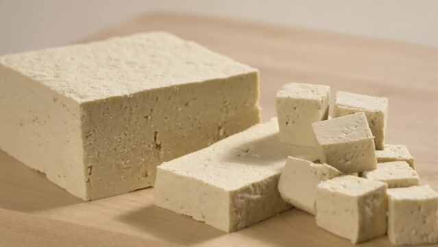 Tofu chunks closeup. Plant based diet. Vegan protein source. Healthy eating. Soybean product