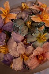 Bouquet of multi-colored tulips on the background