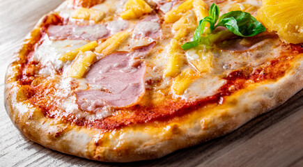 fast food. Hawaiian pizza with pineapple, ham, chicken, cheese, and vegetables