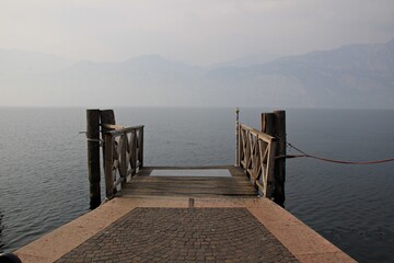 Italy, Garda Lake: Wooden pontoon.