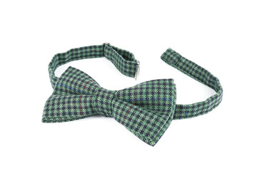 Stylish checkered bow tie isolated on white