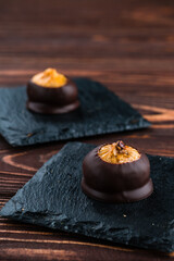Fototapeta na wymiar dried figs in chocolate natural sweets