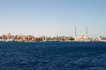 Fototapeta na wymiar Al-Mina Mosque in Hurghada, Egypt. View from the sea