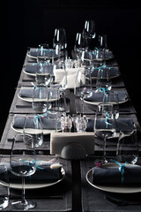Obraz premium beautifully laid tables with glasses and appliances in restaurant