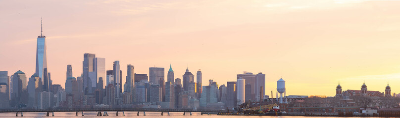 silhouette of the city, Manhattan New York City Panorama photo, early morning with vivid sky.
