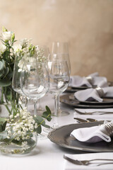 Stylish elegant table setting for festive dinner in restaurant