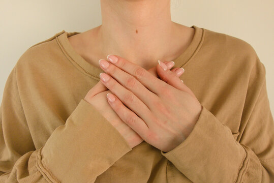 Woman suffering from chest pain