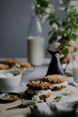 Delicious carrot cookie with vanilla ice cream and milk on breakfast table