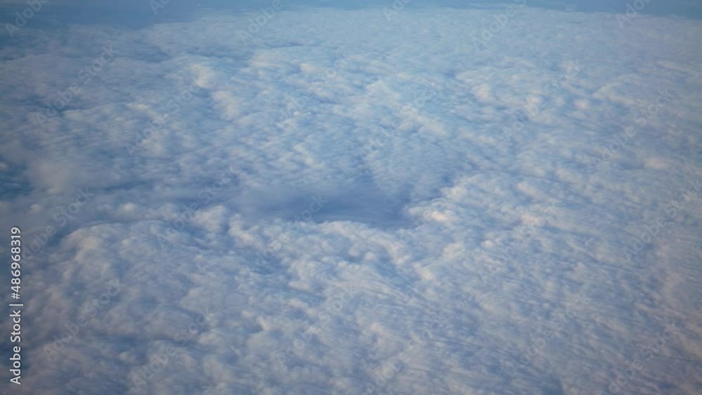 Canvas Prints beautiful cloudscape. panorama above white clouds as seen through window of an aircraft. a view from