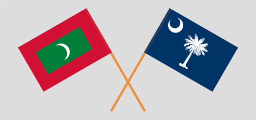 Crossed flags of Maldives and The State of South Carolina. Official colors. Correct proportion