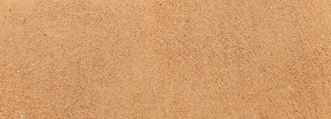 Panorama of Sand texture. Sandy beach for background. Top view. Natural sand stone texture...