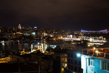 Fototapeta premium Istanbul city night view. A view of Istanbul city center photographed from above at night. A wonderful Istanbul night. lights of istanbul city.