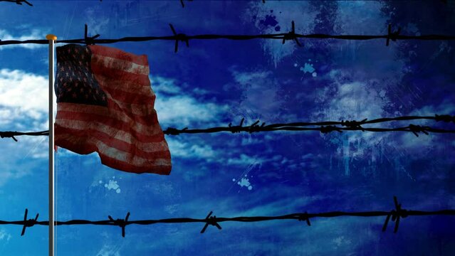 USa flag on pole against barbwire and sky