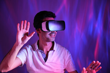 forty year old man with virtual reality goggles freaking out