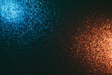 Color light background. Blur glitter glow. Glitz decoration. Defocused blue gold shimmering...