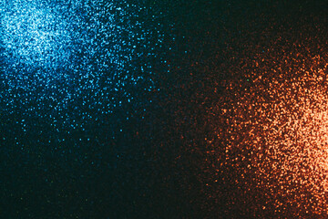 Color light background. Blur glitter glow. Glitz decoration. Defocused blue gold shimmering...