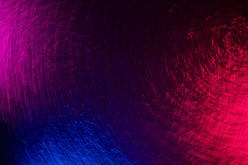 Blur neon glow. Colorful background. Party illumination. Defocused fluorescent blue pink purple light wavy lines texture vibration on dark black abstract overlay. - obrazy, fototapety, plakaty