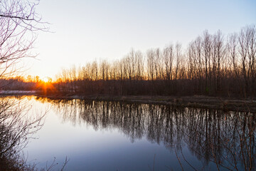 Sunset on a river in winter time