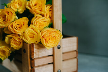 Yellow Flowers on a gray background. Bouquet of beautiful Roses. Flowers for birthday, Valentine's, Mother's Day, March 8, International Women's Day and other holidays.