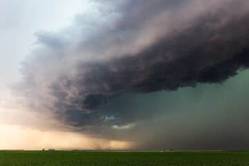Ominous storm clouds over a field