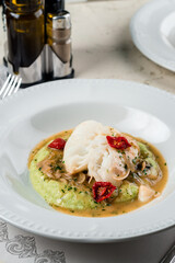 Barramundi or pangasius fish and meat steak with vegetable in plate Healthy food style