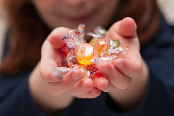 child playing with sweet