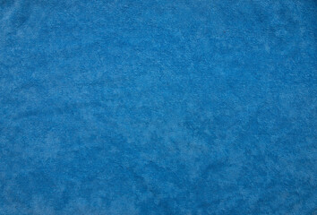 A blue cotton towel as a background. Illustration concept.