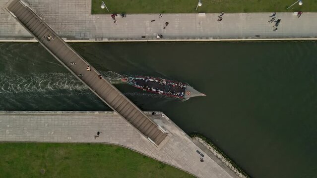 Aerial view. Gondola passing under the bridge in Aveiro, Portugal. Aerial view.