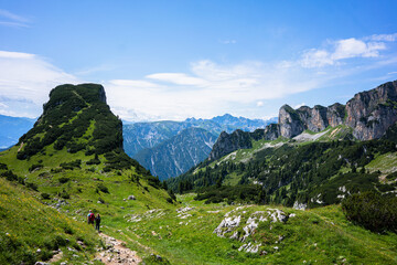 Hikers are on tour at Karwendel Rofan Mountains at Achensee in Austria