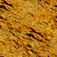 Golden seamless texture with strong diagonal noise. Golden background. The rough surface is yellow on an uninhabited planet.
