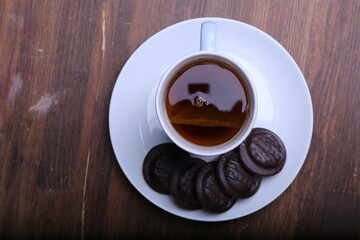 Image of ivory tea cup with sweet heart shaped cookie