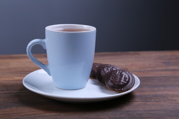 Image of ivory tea cup with sweet heart shaped cookie