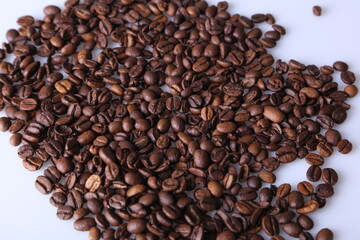 Coffee beans isolated on white background with copyspace for text. Coffee background or texture concept.