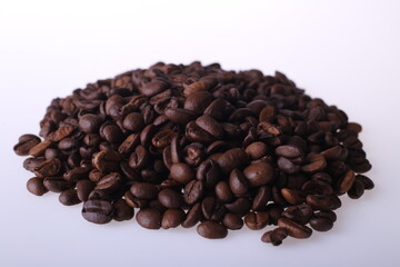 Fototapeta premium Coffee beans isolated on white background with copyspace for text. Coffee background or texture concept.