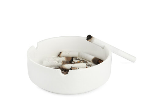 Ceramic ashtray with cigarette stubs isolated on white