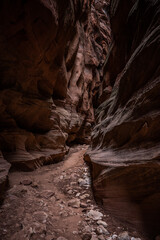 Sand Slowly Filling in The Shadowy Floor of Buckskin Gulch