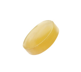 One yellow cough drop isolated on white