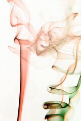 Real colorful smoke on white background. Graphic resource for use with blend modes. Fusion layers.