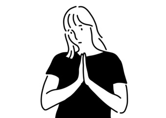 手を合わせて謝っている女の人。