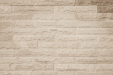 Obraz premium Cream and beige brown brick wall concrete or stone texture background backdrop.