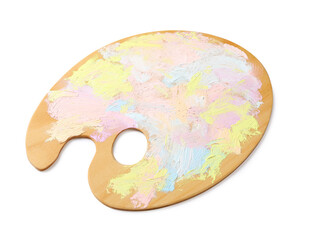 Wooden artist's palette with mixed pastel paints isolated on white, top view