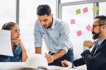 Group of professional business meeting and discussing strategy with new startup project.Creative business people planning and brainstorm with laptop computer in modern office.Teamwork concept